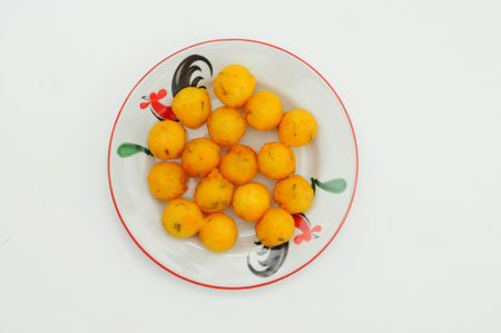 Sala lauak is a typical fried food from Pariaman, West Sumatra which is made from brownish yellow rice flour because it has a mixture of ingredients derived from turmeric.の写真素材