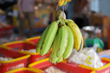 Banana fruit for sale at street food market in Bangkok, Thailandの写真素材