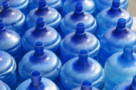 closeup of blue plastic bottles in a market, north chinaの写真素材