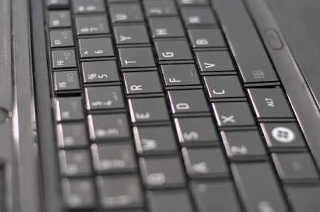 Close up of laptop keyboard with shallow depth of field and selective focusの写真素材