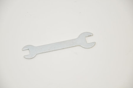 Spanner on white background, close-up of a wrenchの写真素材
