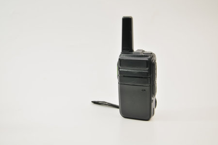 Black portable radio transmitter on white background with copy space for text.の写真素材