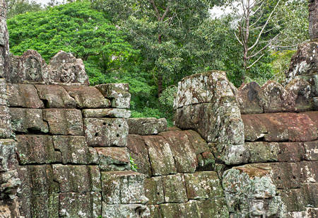 The stone wall at angkor watの写真素材
