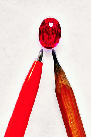 Red stone and pencil