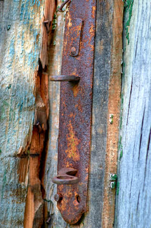 old wooden door with rusty lockの写真素材