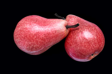 Red pears on a black backgroundの写真素材