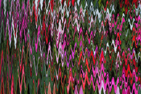 abstract background with zigzag pattern in red and green colorsの写真素材