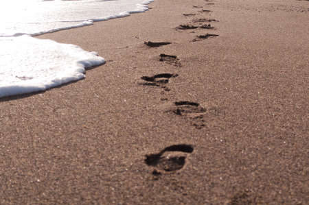 footprints on the beachの写真素材