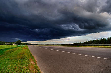 Black clouds over the road