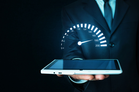 Man holding car speedometer. Speed concept.の写真素材