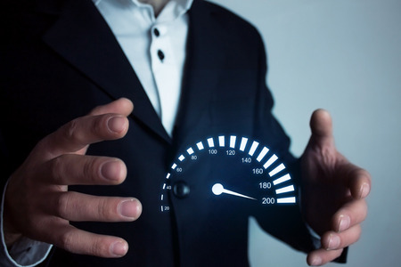 Man holding car speedometer. Speed concept.の写真素材