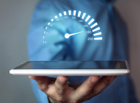 Man holding car speedometer. Speed concept.の写真素材
