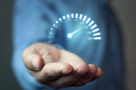 Man holding car speedometer. Speed concept.の写真素材