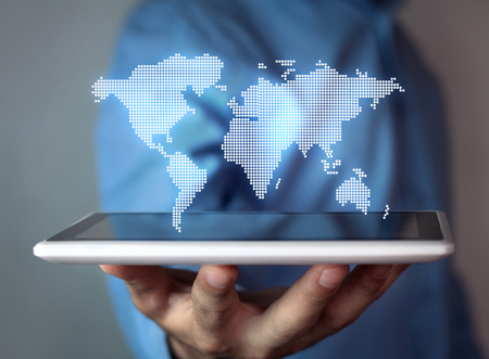 Man holding world map.の写真素材