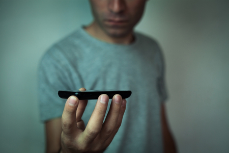 Man holding phone.の写真素材