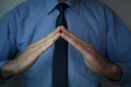 Protecting gesture.の写真素材