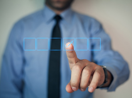 Man with checkbox.の写真素材