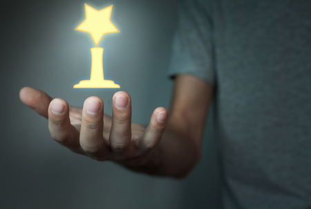 man holding Awardの写真素材
