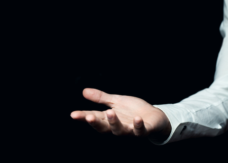 Businessman showing empty hand.の写真素材