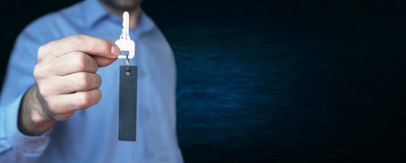 Businessman holding key.の写真素材