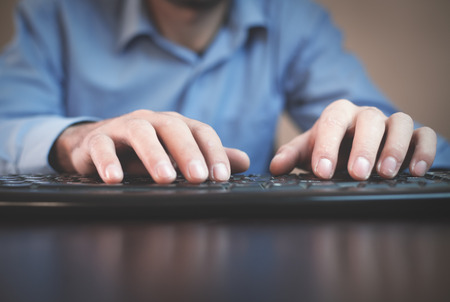 Man working on computer.の写真素材