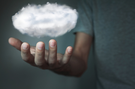 Man holding cloud. Cloud computing concept.の写真素材