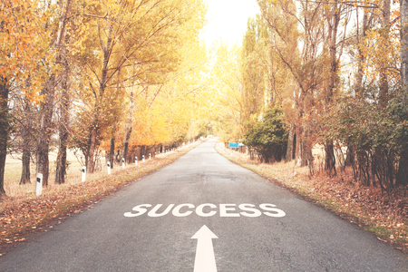 Success word on the asphalt road.の写真素材