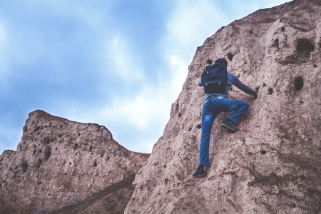 Man climbing the mountain.の写真素材