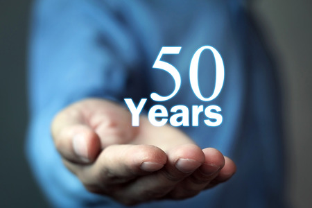 Man hand with 50 years word.