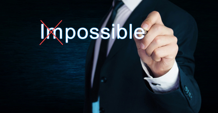 Businessman change Impossible to Possible on screen.の写真素材