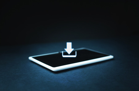 Download sign on a white digital tablet.