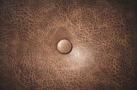 Dark brown leather sofa texture background.の写真素材