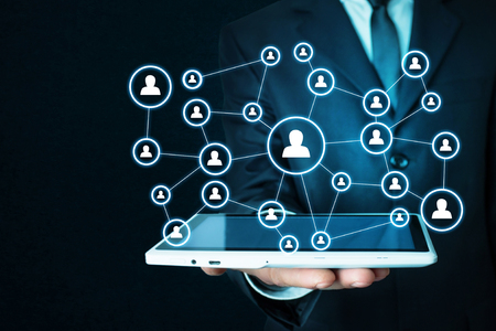 Businessman holding business connection and social network.の写真素材