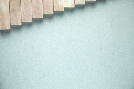 Wooden blocks on gray background.の写真素材