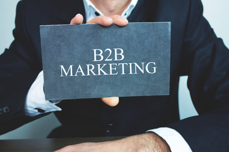 Businessman showing B2B Marketing word on cardboard.の写真素材
