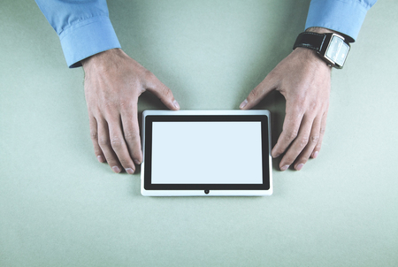Man showing white digital tablet.の写真素材
