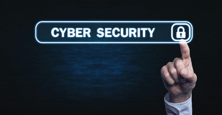 Hand touching virtual screen with padlock icon. Concept of cyber security, data protection and information safety.の写真素材