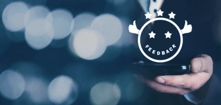 Man holding smiley. Feedback, Business conceptの写真素材