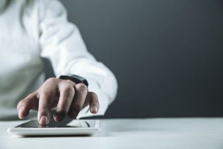 Man using white digital tablet. Business conceptの写真素材
