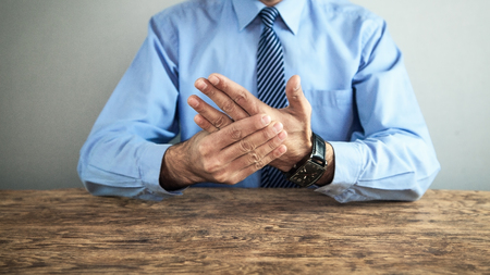 Businessman with wrist pain. Arthritis