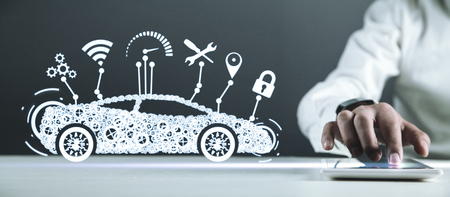 Man holding digital tablet. Modern smart car. Transportation, Technology Conceptの写真素材