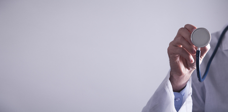 Doctor holding stethoscope. Healthy and Medical conceptの写真素材