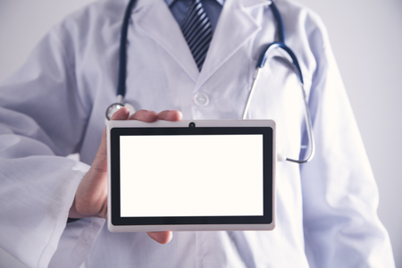 Doctor with digital tablet. Medicine and Healthcare conceptの写真素材