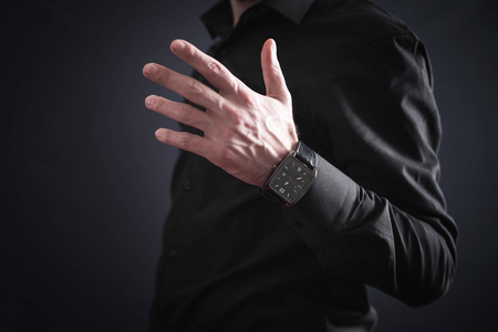 Businessman wearing luxury wristwatch.の写真素材