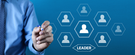 Businessman writes in screen. Concept of Leaderの写真素材