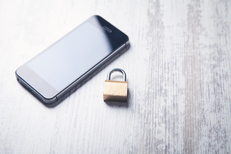 Smartphone with padlock. Security of smartphoneの写真素材