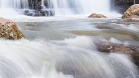 The waterfall with a rocks. Summer timeの写真素材