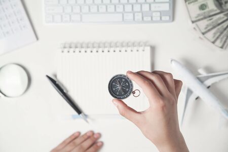 Hand holding compass. Concept of travelの写真素材
