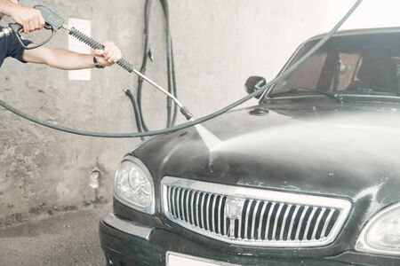 Car washing. The washing process on a self service car washの写真素材
