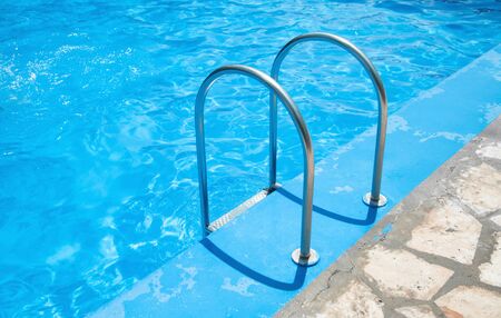 Outdoor pool with blue water. Summer, Swimming